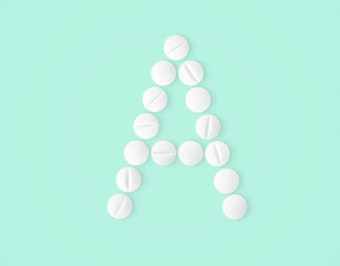 letter A made of vitamin pills