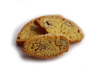 Traditional Italian Cantucci or Cantuccini cookies with almonds isolated on white background
