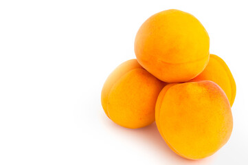 apricots on white isolated background
