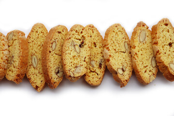 Traditional Italian Cantucci or Cantuccini cookies with almonds isolated on white background