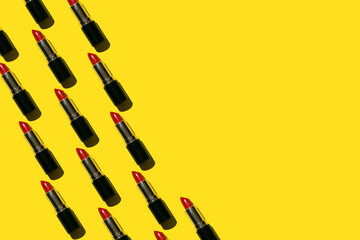 Red lipstick pattern on the yellow background black and gold