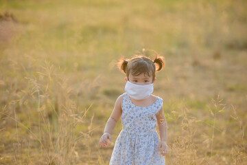 Girl Wearing Face Mask Outdoors.Mask for COVID-19.