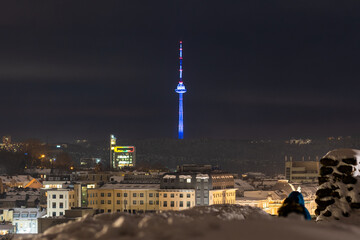 Obraz premium Vilnius city view with TV tower on background in winter with snow,
