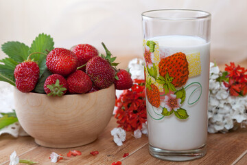 Strawberries and milk in a glass