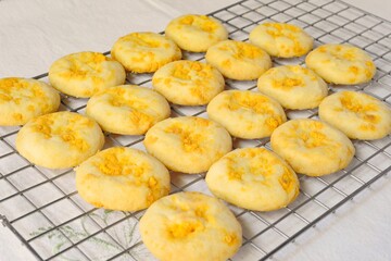 Fresh Homemade Salted egg Cookies on cooling rack.