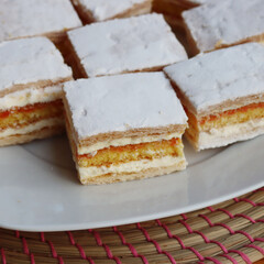 Italian traditional Diplomat or Diplomatic pastries on a plate on wooden table 