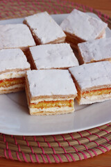 Italian traditional Diplomat or Diplomatic pastries on a plate on wooden table 