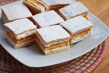 Italian traditional Diplomat or Diplomatic pastries on a plate on wooden table 