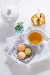 Macarons dessert and cup of tea