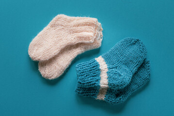 knitted socks on a wooden background