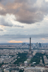 Sunset landscapes of the Paris skyline, view of the Eiffel Tower from the Tour Montparnasse in a cloudy day