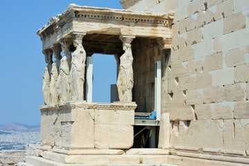 Obraz premium Erechtheion with famous Caryatids, Acropolis hill, Athens historic center, Attica, Greece