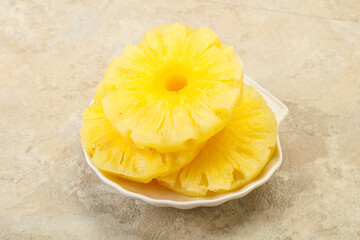 Sweet pineapple rings in the bowl