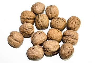 Group of fresh walnuts on white background