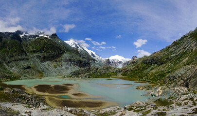 gorgeous lake and sand from a glacier in the mountains panorama