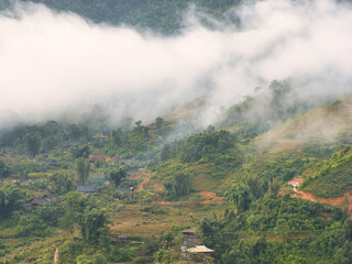 Landscape with a village in the surroundings of Sa Pa in Lào Cai Province in north-west Vietnam on a foggy day