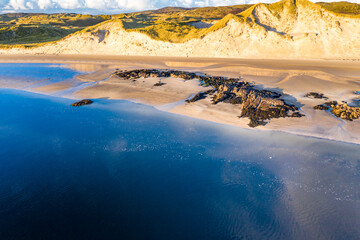 The coast between Kiltoorish bay beach and the Sheskinmore bay between Ardara and Portnoo in Donegal - Ireland