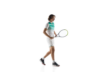 Excited. Young caucasian professional sportsman playing tennis isolated on white background. Training, practicing in motion, action. Power and energy. Movement, ad, sport, healthy lifestyle concept.