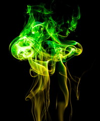 Colored smoke on black background