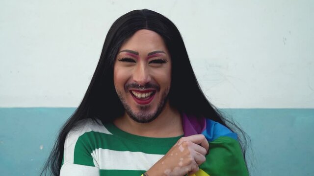 Happy drag queen activist having fun during gay pride parade - LGBT social movement concept