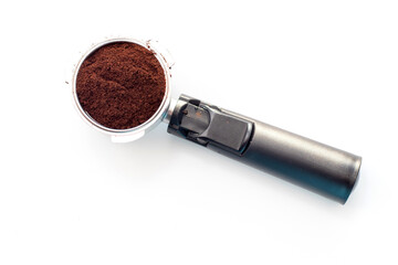 Coffee holder with ground coffee on white background. Top view.