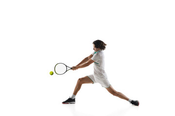 Fototapeta na wymiar Achievement. Young caucasian professional sportsman playing tennis isolated on white background. Training, practicing in motion, action. Power and energy. Movement, ad, sport, healthy lifestyle