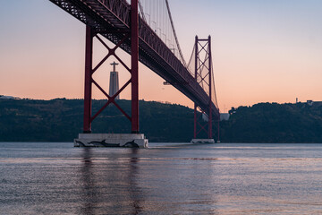Panorama view over the 25 de Abril Bridge. The bridge is connecting the city of Lisbon to the...