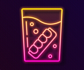 Glowing neon line False jaw in glass icon isolated on black background. Dental jaw or dentures, false teeth with incisors. Vector.