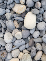 Different colors of pebbles on Reunion island east sea shore