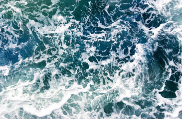 Aerial view to ocean waves.