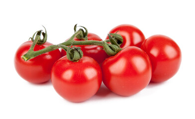 Fresh cherry tomatoes with a sprig isolated on a white background. View from another angle in the portfolio.