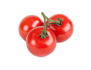 Fresh cherry tomatoes with a sprig isolated on a white background. View from another angle in the...