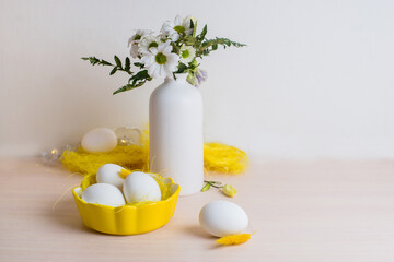 Happy Easter. Congratulatory easter background. Easter eggs and flowers. Background with copy space. Selective focus.
