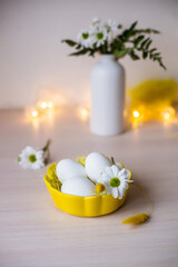 Happy Easter. Congratulatory easter background. Easter eggs and flowers. Background with copy space. Selective focus.
