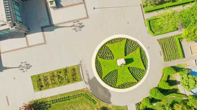 Aerial view of landscaping design of national georgian flag on ground made of flowers Landscaping and architecture background