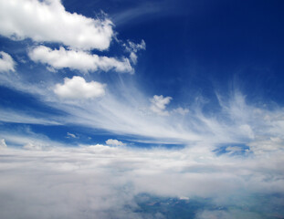 Naklejka na ściany i meble Clouds a view from airplane window