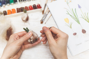 Process of dry felting. Needle felt, wool weaving handmade craft. Inspired by nature. 