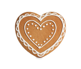 Gingerbread heart decorated with icing isolated on white