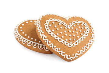 Gingerbread hearts decorated with icing on white background