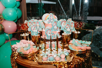 Candy Bar with Sweets. Cake, cookies, lemonade, creamy muffins, fresh berries for celebratory birthday. Candy Bar on the Outdoors.