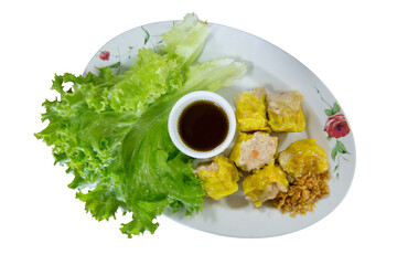 Top view Many of Dumplings with sour sauce on white background