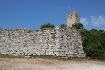 Ruins of the ancient brick castle on the summer sunny day in Istria.