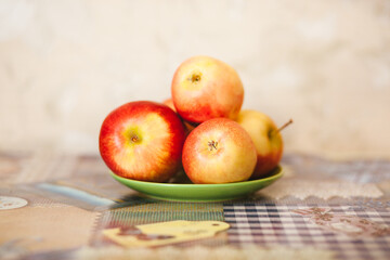 Naklejka na ściany i meble Apples on the table - simple still life