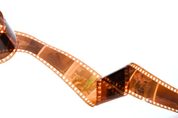 The film strip for old film cameras is stretched, the background