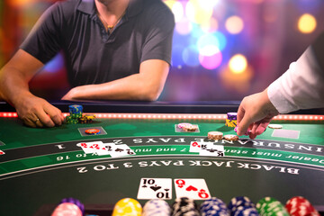 Man playing BlackJack at the casino