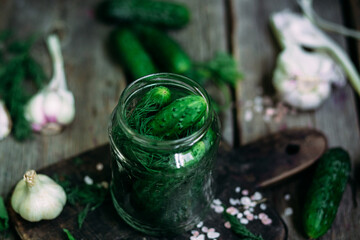 Cucumbers in a jar The process of pickling fresh cucumbers.