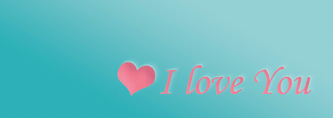 the inscription on the picture I love you. text on turquoise background. valentine's day concept.