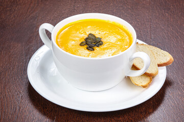 Tasty pumpkin soup with seeds