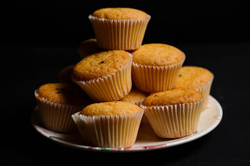 cupcakes on a black background. Baking 