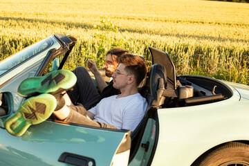 White young models men talking in the car